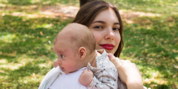 Why do babies throw up after drinking milk?