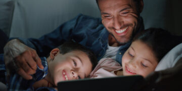Why I allow my husband to drag out putting the kids to bed