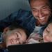 Why I allow my husband to drag out putting the kids to bed
