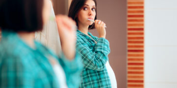 How do your teeth and gums change while you’re expecting?