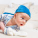When will a baby start to roll over?