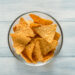 What do the black spots on the corn chips signify?