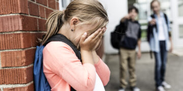 Ways to help your daughter deal with mean girls in school